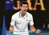  ?? Andy Brownbill / Associated Press ?? Novak Djokovic rejoices after beating Daniil Medvedev for a third straight Australian Open title.