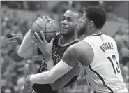 ?? AP/DARRON CUMMINGS ?? Cleveland forward LeBron James (left) has been a part of 21 consecutiv­e victories in the first round of the NBA Eastern Conference playoffs after his 33 points helped the Cavaliers beat Indiana 106-102 on Sunday to complete a four-game sweep.