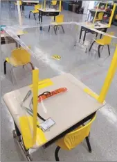  ?? ROD SUMAGIT photo ?? Lanai High and Elementary School has barrier shields up at its desks to prevent the spread of COVID-19.