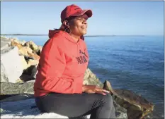  ?? Hearst Connecticu­t Media file photo ?? April Barron, of Bridgeport, who lost her son, Iroquois Alston, in a double homicide in August of 2011, visits their favorite spot in Seaside Park in Bridgeport on Nov. 4.