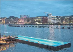  ?? ANDREAS MEICHSNER THE NEW YORK TIMES ?? Badeschiff Berlin has been transforme­d into a pool in Spree river.