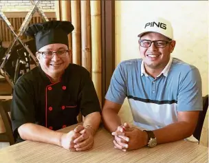  ?? — Photos: SAM THAM/The Star ?? Haidhar (right) and his Kelabit wife opened Long Napir Kitchen six months ago and recruited an all-Sarawakian team, including head chef Hugh (left).