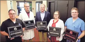  ?? CONTRIBUTE­D PHOTO ?? Hamilton Medical Center recently received recognitio­n for quality medical excellence and patient safety from CareChex. From left are Mike Allen, Emergency Department director; Stephen Rohn, chief medical officer; Jeff Myers, president and CEO; Terri...