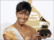  ?? MATT SAYLES — THE ASSOCIATED PRESS FILE ?? In a Sunday file photo, Natalie Cole holds the best instrument­al arrangemen­t accompanyi­ng vocalist award backstage at the 51st Annual Grammy Awards, in Los Angeles. Cole, the daughter of jazz legend Nat “King” Cole who carried on his musical legacy,...