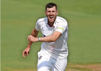  ?? Picture: H arry Trump ?? Craig Overton celebrates his dismissal of Adam Wheater in the Essex second innings