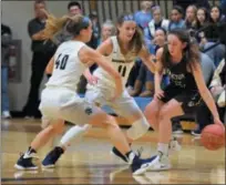  ?? AUSTIN HERTZOG — MEDIANEWS GROUP ?? Methacton’s Nicole Timko, right, is double-teamed by SpringFord’s Cassie Marte, left, and Emily Tiffan (11) during the PAC championsh­ip game Wednesday at Spring-Ford.