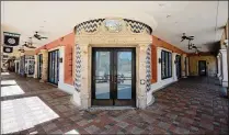  ?? BRUCE R. BENNETT / THE PALM BEACH POST ?? The former Uncle Julio’s Mexican restaurant space at Mizner Park sits empty. Uncle Julio’s closed in March after 10 years; a bowling alley may be coming to the space.