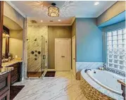  ?? Photo courtesy of Caliber Constructi­on Group ?? This is a master bath project completed by Caliber Constructi­on Group/Certified Restoratio­n.