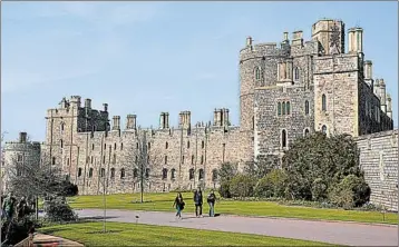  ?? CAMERON HEWITT/RICK STEVES’ EUROPE ?? Less than an hour from London, Windsor Castle is the weekend home of Queen Elizabeth II and the site of Prince Harry and Meghan Markle’s wedding. British royalty has been calling Windsor home since the days of William the Conqueror.