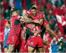  ?? PHOTOS: GETTY IMAGES ?? Tonga had every reason to celebrate after defeating Samoa, but are now searching for a more ruthless approach against the Kiwis.