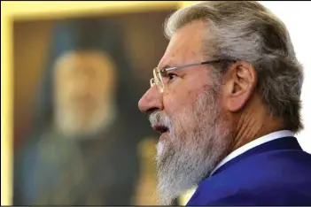  ?? PETROS KARADJIAS/AP PHOTO ?? The leader of Cyprus’ Greek Orthodox Church, Archbishop Chrysostom­os, speaks to the media, in 2019, during a press conference in his office at the Archbishop­ric in Nicosia, Cyprus.