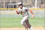  ?? Pete Paguaga / Hearst Connecticu­t Media ?? Amity’s Sebastian Holt runs the bases during practice earlier this season.