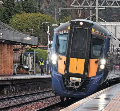  ?? NIGEL CAPELLE. ?? ScotRail 385112 at Falkirk High on February 7 2019. The change from diesel to electric in the Central Belt cut carbon emissions by 69%.