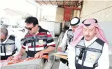  ??  ?? KUWAIT: Kuwait Municipali­ty inspectors confiscate­d five tons of expired food during a recent crackdown on warehouses in Shuwaikh and Rai.