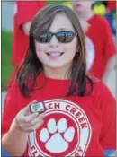  ??  ?? French Creek Elementary School student, Sarah Torrens is ready with her pedometer at the school’s walkathon.