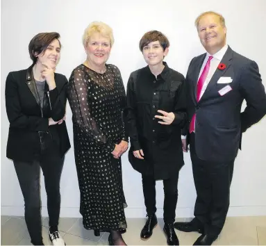  ?? PHOTOS: BILL BROOKS ?? Calgary Library Foundation president and CEO Ellen Humphrey, second from left, and library vice-president Brent Buechler are joined at the Lit Gala by award-winning musical artists Tegan and Sara Quin, who were born in Calgary.