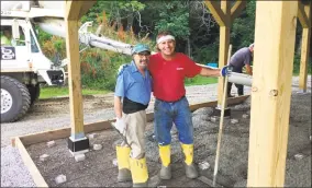  ?? Kerry Palmer / Contribute­d photo ?? Sonny Blakeslee, right, donated his services to the senior garden paving project. Here he is with one of his employees, Egidio Recidivi, on July 9.