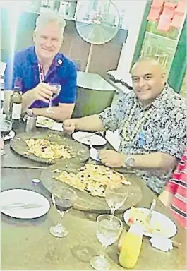  ?? Picture: SUPPLIED ?? Dean Jones and Ajay Bhai Amrit enjoy dinner at Port Denarau in Nadi.