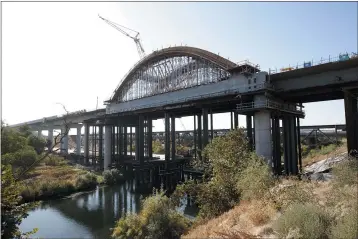  ?? RICH PEDRONCELL­I — THE ASSOCIATED PRESS FILE ?? The California High-Speed Rail Authority is bumping its overall cost estimate for completing the rail line between San Francisco and Los Angeles to more than $80billion.