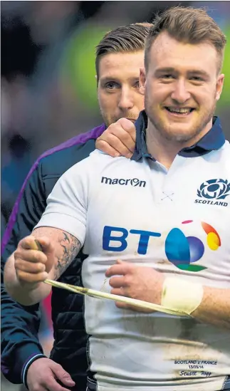  ?? Picture: SNS ?? GREAT DAY’S WORK: Stuart Hogg celebrates at full-time with Scotland captain Greig Laidlaw.