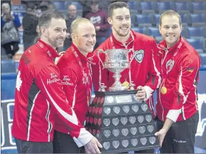  ?? CP PHOTO ?? Team Canada skip Brad Gushue, third Mark Nichols, second Brett Gallant and lead Geoff Walker, left to right, pose with the Brier Tankard after defeating Alberta 6-4 to win the Tim Hortons Brier at the Brandt Centre in Regina on Sunday, March 11.