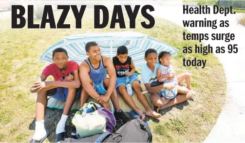  ?? DEBBIE EGAN-CHIN / NEW YORK DAILY NEWS ?? Cousins (from left) Ameer Lester, Snawing Alvarado, Justin Duarte, Amaad Lester and Mia Elizabeth chill in the shade of their beach umbrella.