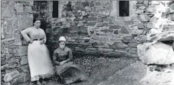  ??  ?? Two ladies in Iona Abbey’s north transept. No date.