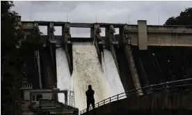  ?? Photograph: Dan Himbrechts/AAP ?? The Warragamba Dam is Sydney’s largest drinking water catchment. Despite being at capacity, only a quarter of the dam’s water is drinkable as heavy rain puts pressure on filtration systems.