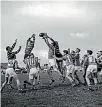  ?? SWAINSON/WOODS COLLECTION ?? These young men competed in a rugby game at Francis Douglas Memorial College. Please let us know if you know any of the rugby players involved in this line-out.