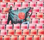  ??  ?? Bangladesh's supporters cheer for their team at Zahur Ahmed Chowdhury Cricket Stadium in Chittagong.