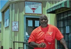  ?? Yi-Chin Lee / Staff photograph­er ?? Kenneth Washington, owner of Just Oxtails Soul Food, is still waiting to see if he will get a loan and wondering if he'll be able to open again.