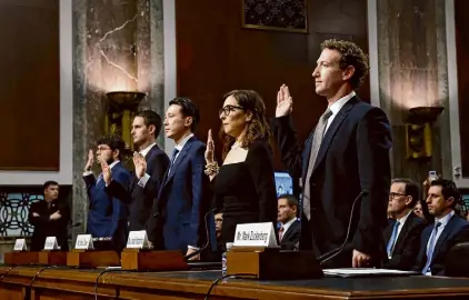  ?? Anna Moneymaker/Getty Images ?? From left: Jason Citron, CEO of Discord; Evan Spiegel, CEO of Snap; Shou Zi Chew, CEO of TikTok; Linda Yaccarino, CEO of X; and Mark Zuckerberg, CEO of Meta, are sworn in prior to their testimony before the Senate Judiciary Committee on Wednesday.