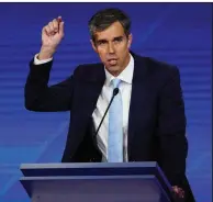  ?? AP/DAVID J. PHILLIP ?? Beto O’Rourke spoke out on assault-type weapons during the Democratic presidenti­al debate Sept. 12 in Houston. On Wednesday, he accused President Donald Trump of cowardice on gun laws.