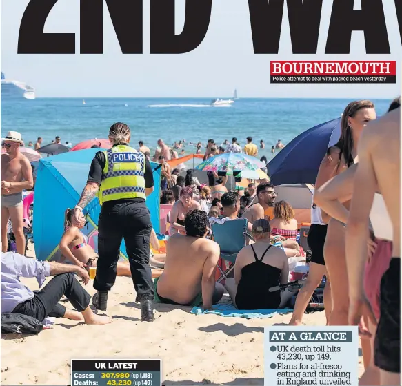  ??  ?? Police attempt to deal with packed beach yesterday BOURNEMOUT­H