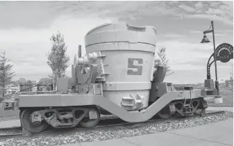  ?? DAVID JALA/CAPE BRETON POST ?? This oversized tipping-bucket sits on a rail car at the Prince Street entrance to Sydney’s Open Hearth Park. It is a reminder of the once renowned steel plant that defined Sydney’s landscape for 100 years.