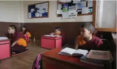  ??  ?? Nuns study inside a classroom of the Arya Tara school on the outskirts of Kathmandu, Nepal. Run by Drolma, the school offers girls free education.