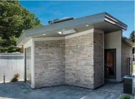  ??  ?? Bottom The stone-clad pool house accommodat­es a cedar-lined change room, bathroom, and storage