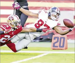  ??  ?? Sterling Shepard hauls in spectacula­r one-handed catch on Sunday for one of few bright spots on yet another disastrous day for Giants as Big Blue falls to previously winless Niners.