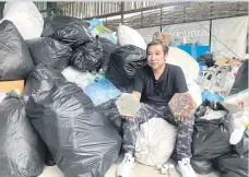  ??  ?? Asst Prof Wechsawan Lakas shows off the recycled paving blocks.