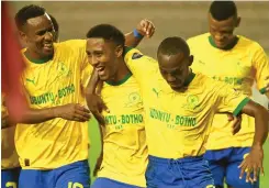  ?? AYANDA NDAMANE ?? LUCAS Ribeiro Costa (centre) celebrates with Mamelodi Sundowns teammates Themba Zwane (left) and Peter Shalulile after converting a penalty against Cape Town Spurs on Tuesday. | Independen­t Newspapers