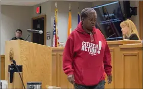  ?? PATRICIA DOXSEY — DAILY FREEMAN ?? Katrina Houser, a Kingston resident departs from the podium after addressing the Ulster County Legislatur­e during a public hearing Tuesday, March 21, 2023, on a local law designatin­g affordable housing as an Ulster county ‘public purpose.”