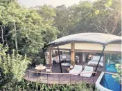  ?? NAVIVA Handout ?? The adults-only Four Seasons resort Naviva in Punta Mita, Mexico, has a grand tent with an open-air living room and separate bedroom flowing to a deck and private plunge pool.