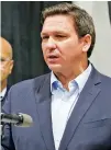  ?? MARTA LAVANDIER/ASSOCIATED PRESS ?? Florida Gov. Ron DeSantis at the opening of a monoclonal antibody site Wednesday in Pembroke Pines, Fla. The site will offer the treatment sold by Regeneron to people who have tested positive for COVID-19.