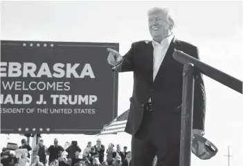  ?? SCOTT OLSON/GETTY ?? Former President Donald Trump arrives for a rally at the I-80 Speedway on Sunday in Greenwood, Neb.