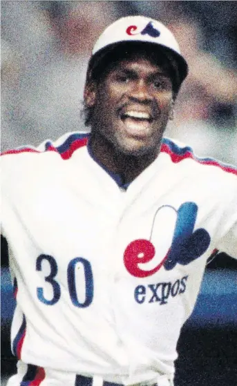  ?? BILL GRIMSHAW/THE CANADIAN PRESS ?? The Montreal Expos’ logo and hat worn by Tim Raines in 1989 remain fashionabl­e looks in Canada, even though it’s been 14 years since the Expos left Montreal for Washington.