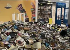  ?? Bookends ?? Some of the damage at Bookends bookshop in Dubai