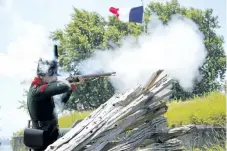  ?? HARLEY DAVIDSON/POSTMEDIA NEWS ?? Mike O'Reilly, a volunteer with Old Fort Erie shoots off a blank during the weekend of Napoleonic re-enactments at Old Fort Erie.