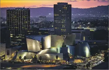  ?? Kent Nishimura Los Angeles Times ?? WALT DISNEY Concert Hall, designed by Frank Gehry, opened its doors Oct. 24, 2003, to great fanfare.