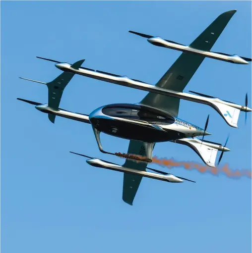  ?? ?? Prosperity, a five-seat electric vertical takeoff and landing aircraft, flies during a demonstrat­ion flight in Shenzhen, Guangdo