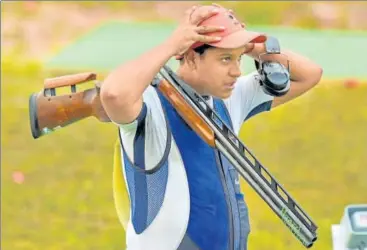  ?? PTI ?? Coached by Mansher Singh, Indian shooter Shardul Vihan (in pic) won silver in men's double trap in Palembang on Thursday.